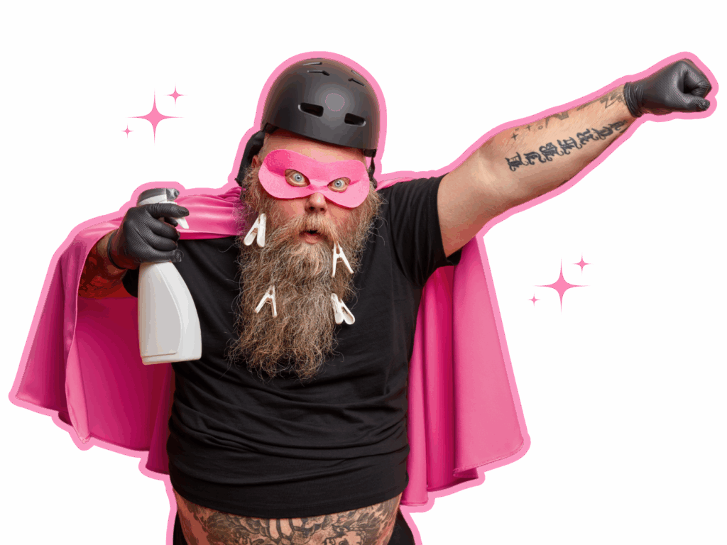 Bärtiger Mann im pinken Cape und schwarzer Kleidung als Comic-Held mit Sprayflasche – Polarglanz Putzfirma Hamburg.